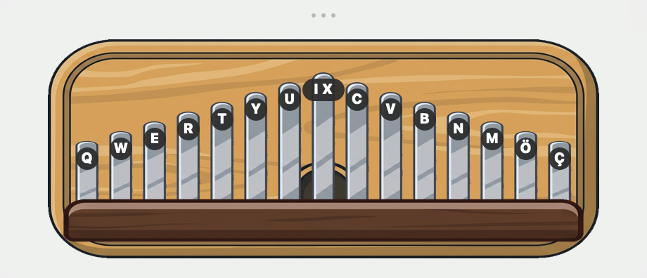 A kalimba: metal tines on a wooden board, the longest in the middle, fanning shorter towards each edge.