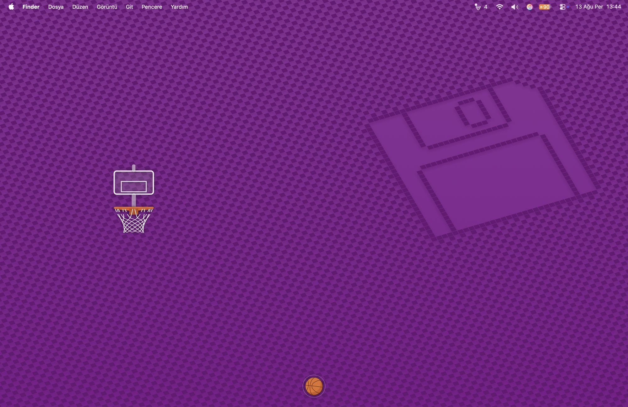 The hoop hanging quietly on the left of an otherwise empty desktop, the ball at rest along the bottom edge.